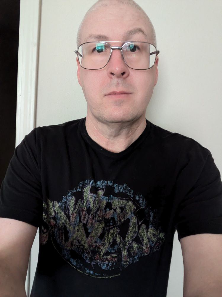 It's a picture of me in a Wyld Stallyns t-shirt showing my glasses. 