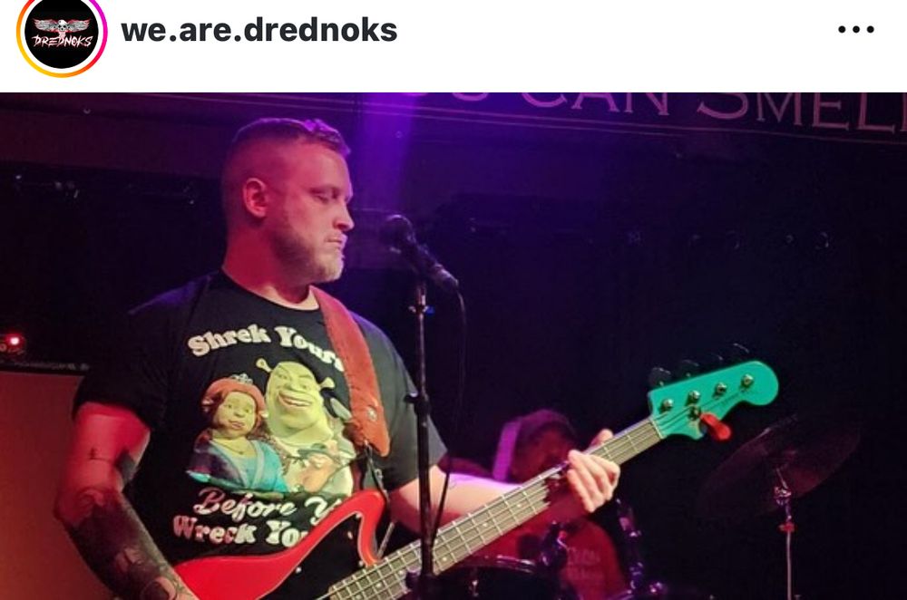 Picture of the bassist for drednoks. Who is a prison guard for OSP. 