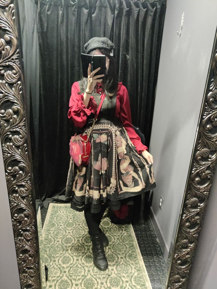 Black jsk with strawberry motifs, red blouse, strawberry purse
Pic taken in a thrift store