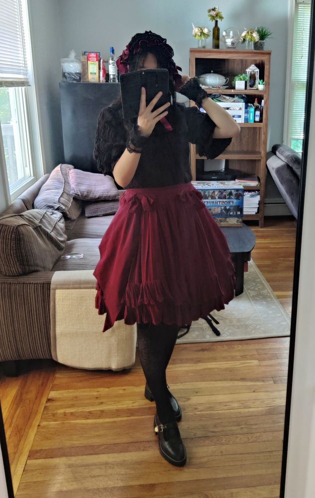 Same skirt with bat wings attached on the side