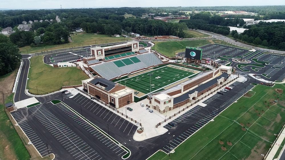 The gridiron still reigns supreme across the South and Midwest, and these stadiums reflect that community culture.