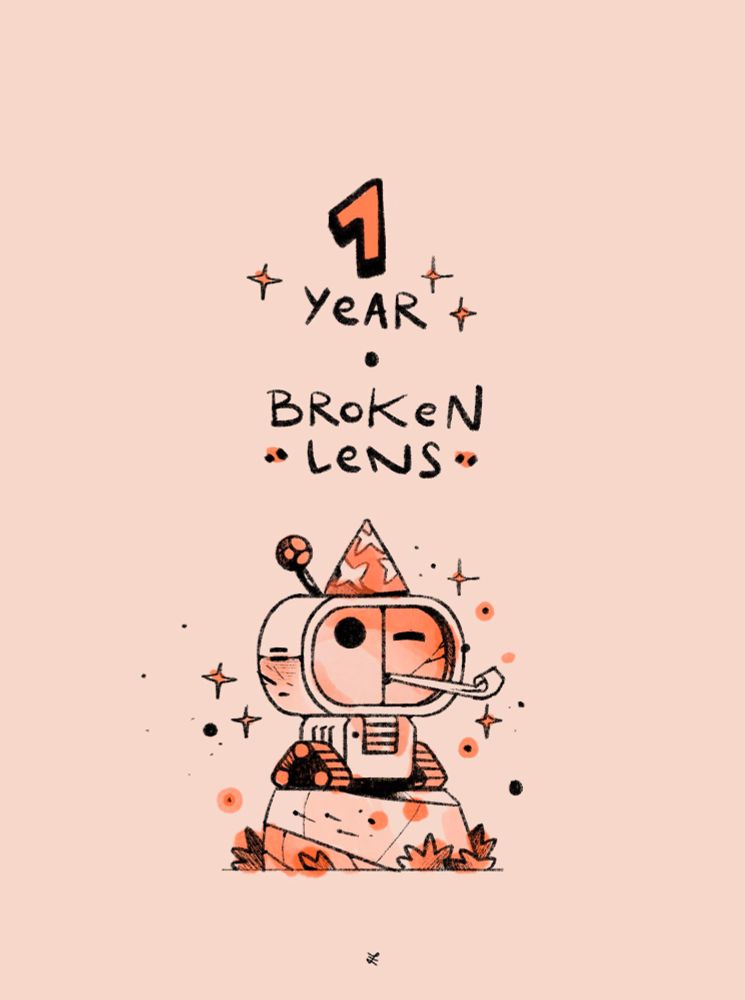 Text: "1 Year Broken Lens"
The robot from the video game Broken Lens is celebrating his first anniversary with a party hat on his head while blowing a party blower.