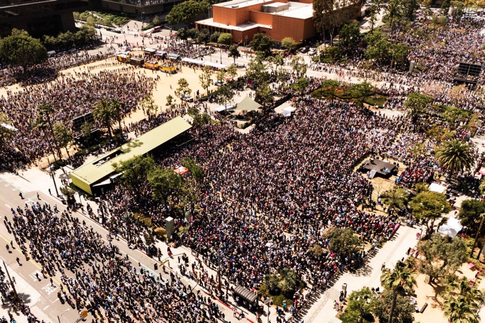 An overhead shot showing the crowd in the main square 