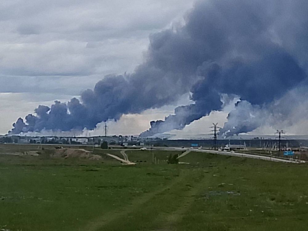 A photo of Belaya Airfield, Irkutsk region with thick plumes of smoke rising into the air as drones destroy Russian bombers. Photo credit to Ukraine Security Service, SBU