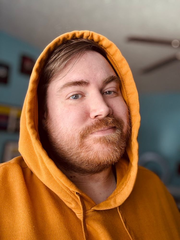 Selfie in a goldenrod hoodie