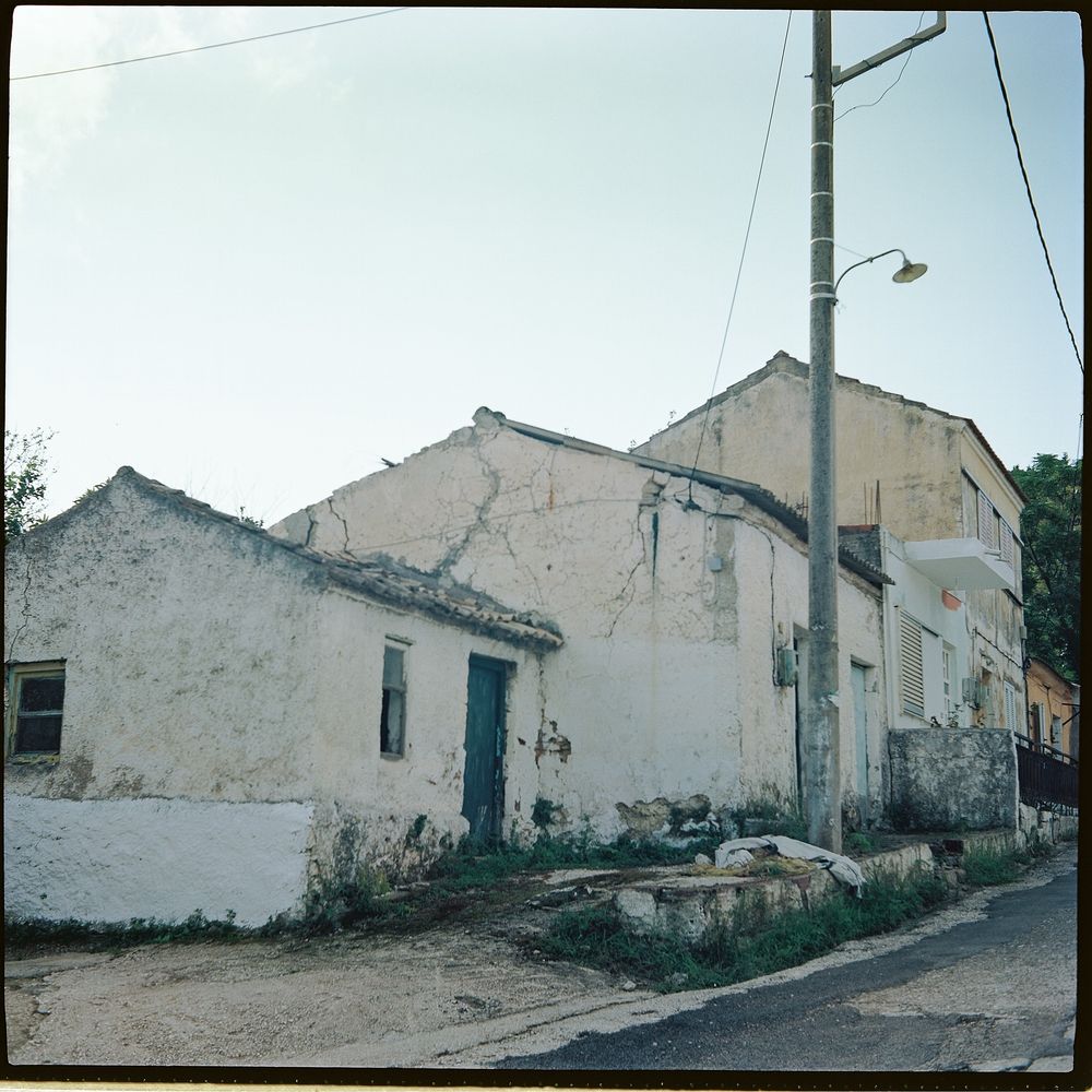 🎞️ Kodak Portra 160
📷 Voigtländer Perkeo II 

Worn houses on an uphill paved road somewhere in the mediterranean mountains. A light pole allocates power lines to the surrounding buildings.