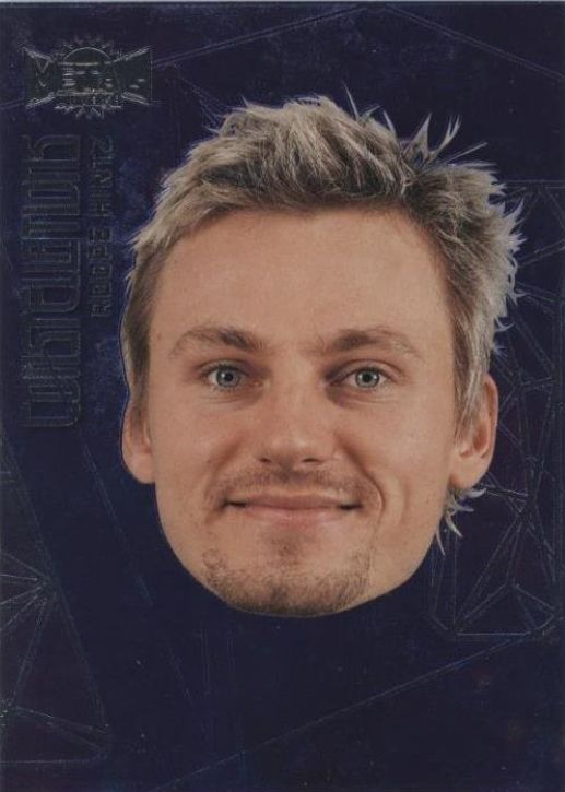 Picture of an Upper Deck trading card featuring hockey player Roope Hintz from the Dallas Stars. It's just a giant picture of his head with a  background of black and gold constellations. The text reads: "Constellation: Roope Hintz". It's a strange card.