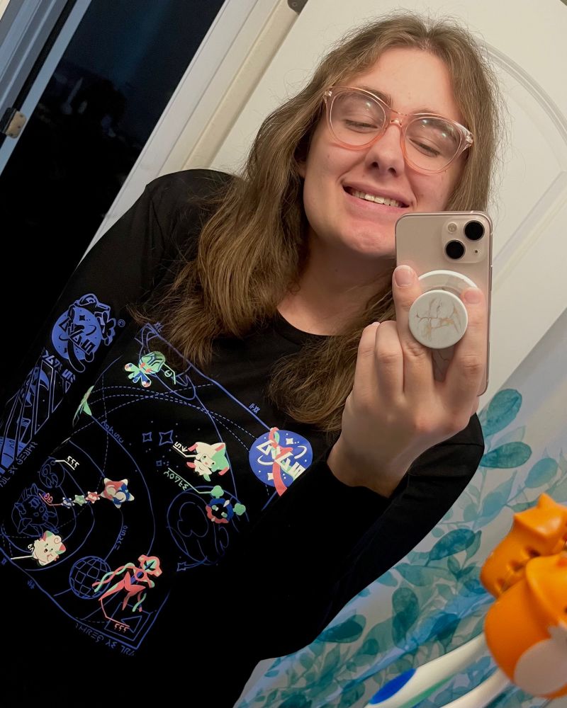 mirror selfie of me with a cool spaced themed pokémon shirt