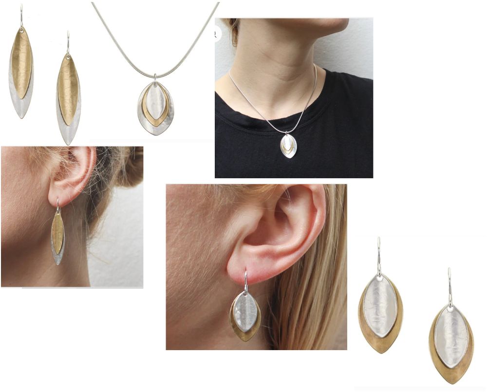 Necklace and earings. Necklace has 3 leaves, silver, brass, silver, in some oval shape. Earings match the design of the necklace, but with only 2 leaves. One pair of earings is elongated, silver and brass, the other pairs brass and silver