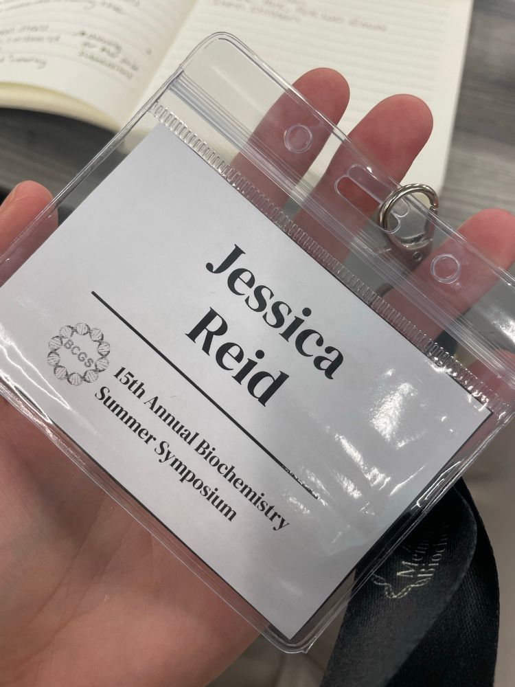 My name tag for the 15th annual biochemistry summer symposium with the Memorial University Biochemistry Grad Student logo