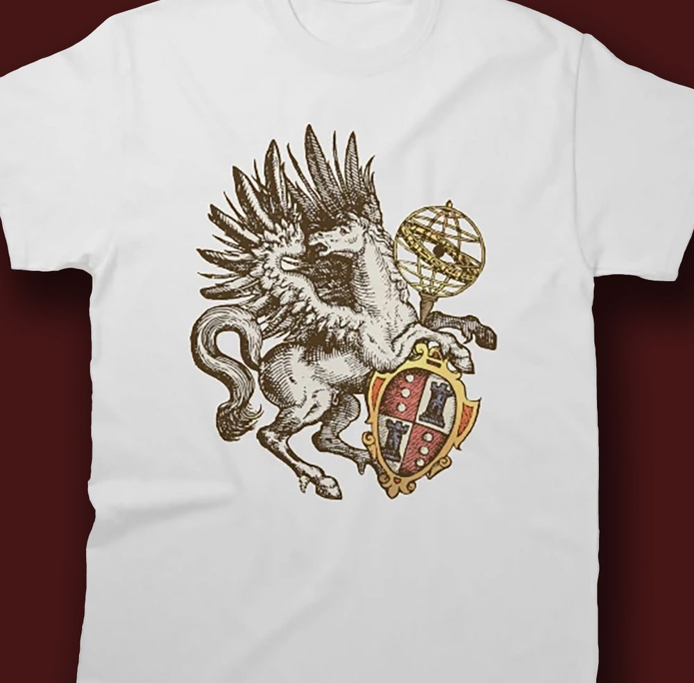 A T-shirt with a graphic of Pegasus holding an armillary and a shield.