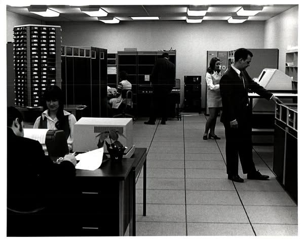 Original CompuServe computer room, 1969.  DEC PDP-10 (KA), MA-10 memory cabinets (16K 36 bit words each), RD-10 drum (for swapping), RP02 disk drives, oodles of DECtapes for offline customer storage.