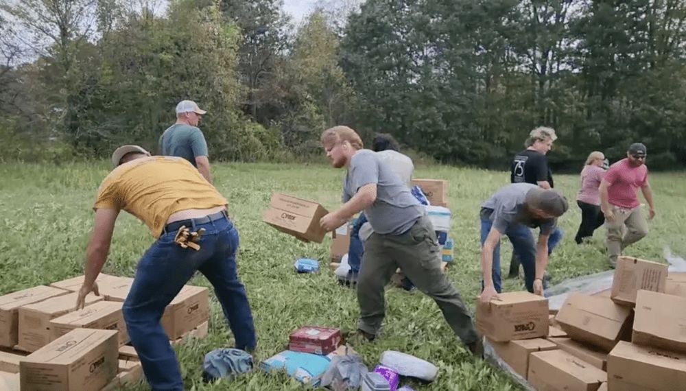 HELENE: U.S. Army personnel load Chinook helicopter with aid for North Carolina Communities hit by Hurricane Helene