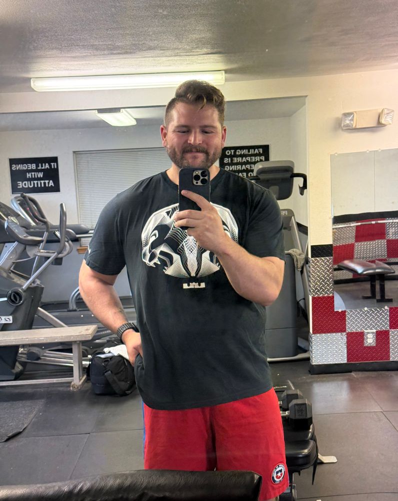 Dude posing in gym