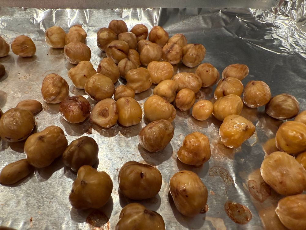 Close up of golden roasted hazelnuts. 
