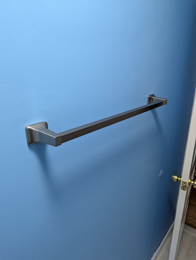 Towel bar successfully installed. Has stayed there for seventeen full minutes now