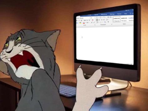 Tom the cat from the cartoon, Tom and Jerry, sitting in front of a desk with a computer screen on it and a blank word document open on it, while Tom writhes in pain, looking away from the screen in disgust