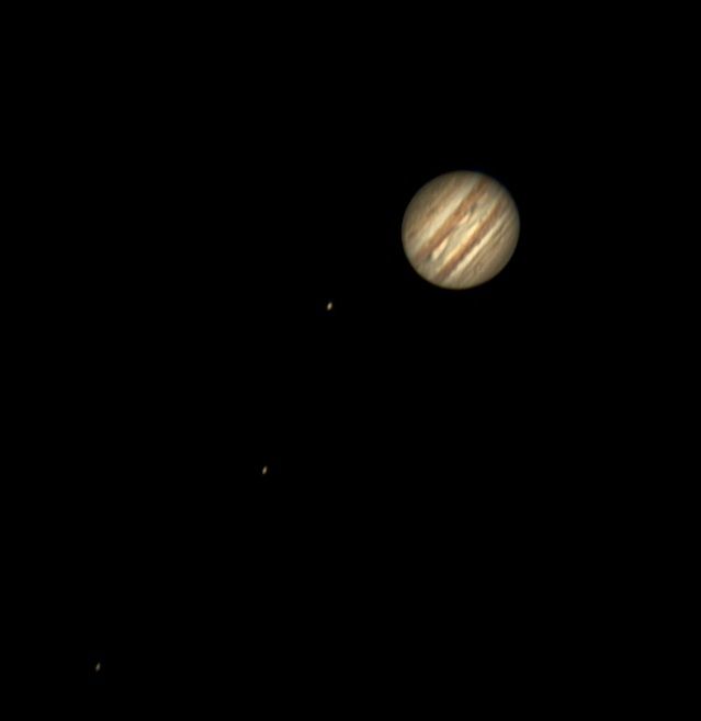 a picture that I took of Jupiter with its moons Gyanmede, Io, and Europa (from right to left)