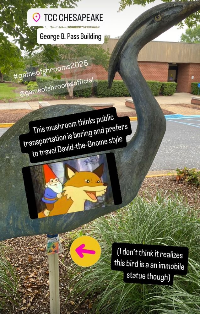 A small colorful mushroom painting attached to a statue of a bird at TCC Chesapeake.