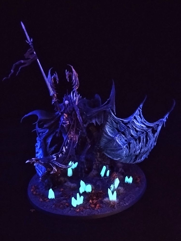 Prince Vordhrai on dragon taken in low light with black light torch 