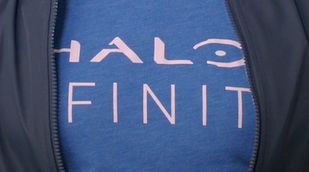 Phil Spencer "Halo Infinite" t-shirt that looks like "Halo Finit" with his jacket covering some of the text.