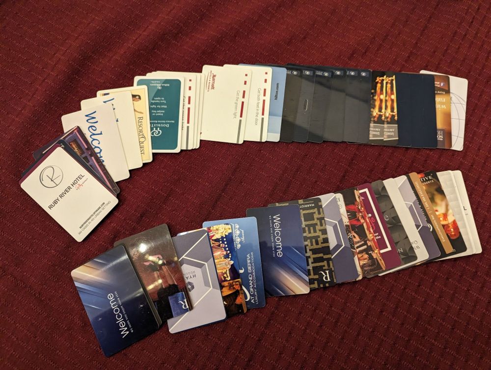 A bunch of electronic key cards from various convention hotels