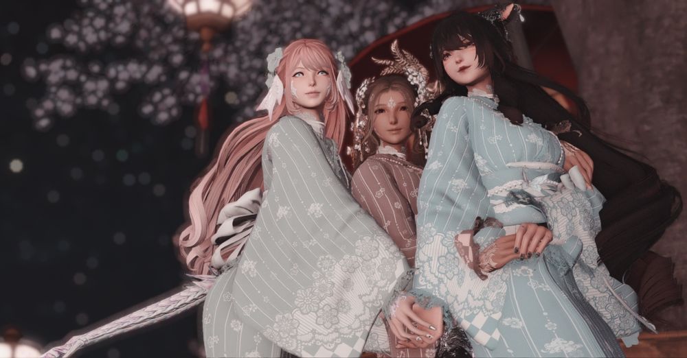 Cassia, Mera, and Rilla are standing together bunched up. Cassia holds Rilla's hand while Mera holds Rilla's other hand.