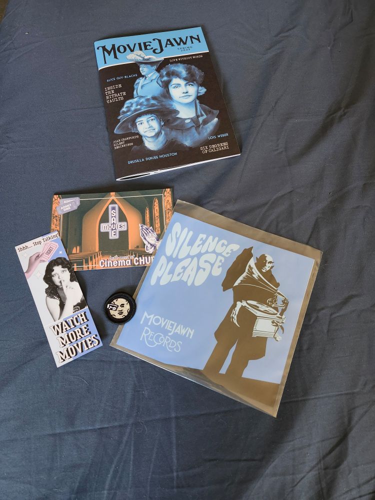MovieJawn Spring 2025 Silent Film issue with its included swag: Silence Please 45 vinyl record, Cinema Church postcard, bookmark, and Journey to the Moon merit badge.