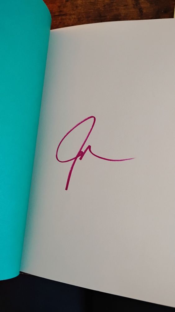 Everything is Tuberculosis signature page with a berry-colored J-scribble