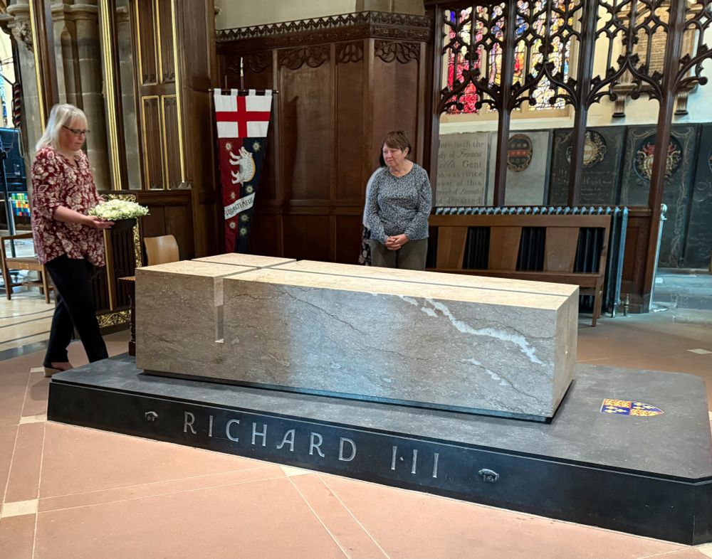 Amanda Geary brings in the wreath.