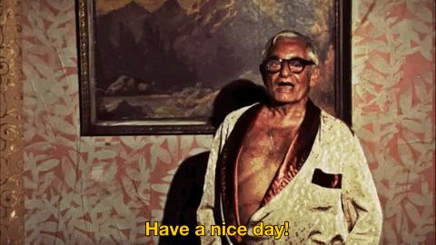 Gif of old man in a bathrobe saying “have a nice day!”from the movie - The Forbidden Room.