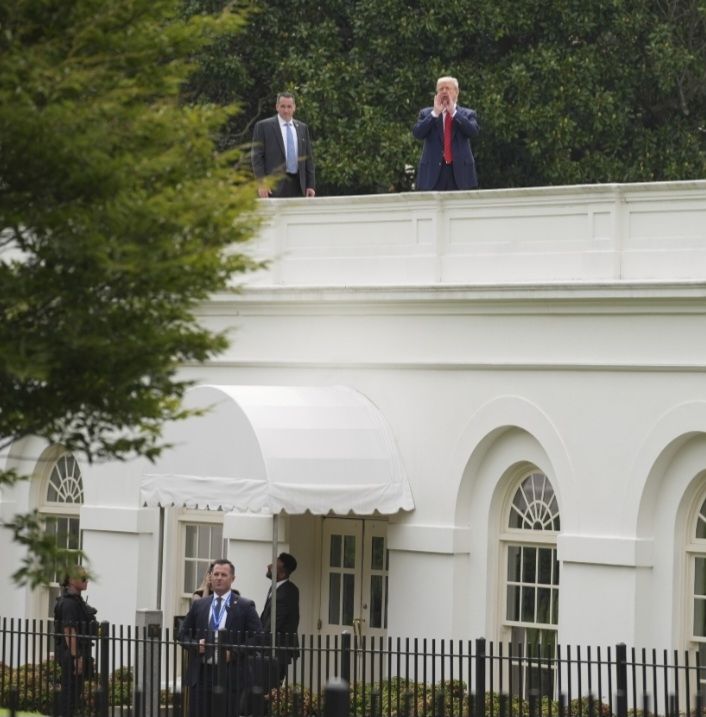 Donald Trump on the roof of the White House.
