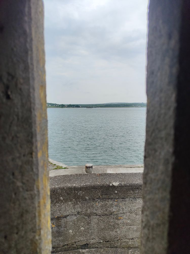 A photo taken from the lookout tower in  Carrigaholt Castle looking out over the Shannon Estuary. 
