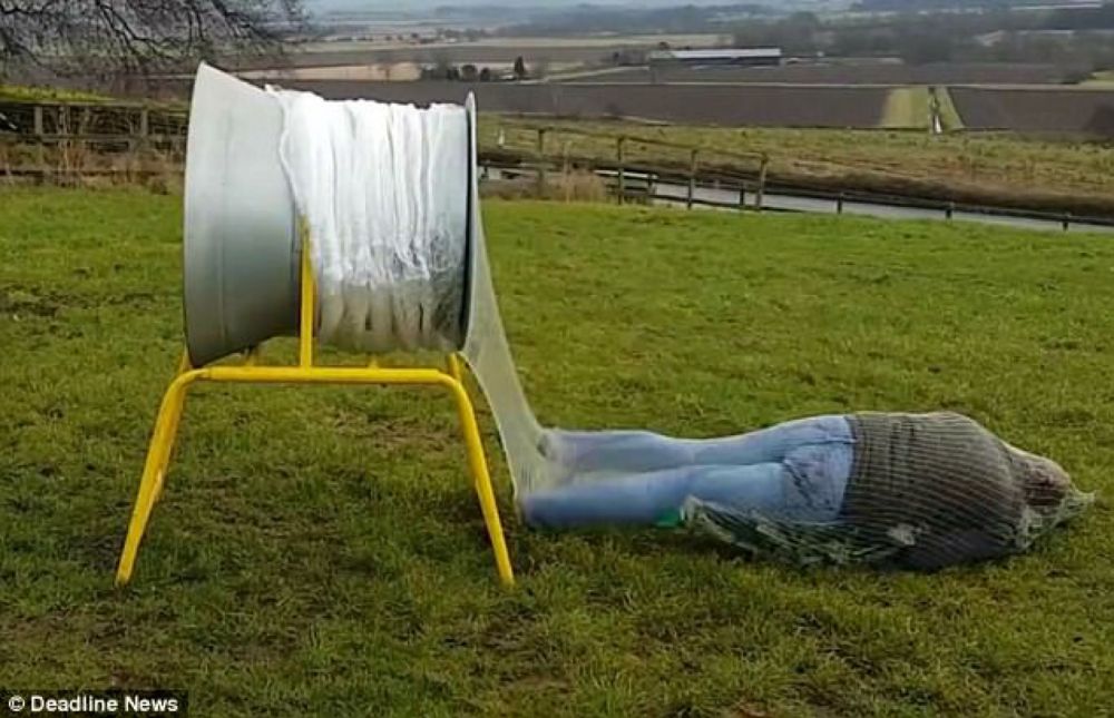 All wrapped up like a Xmas tree and having a little snooze.