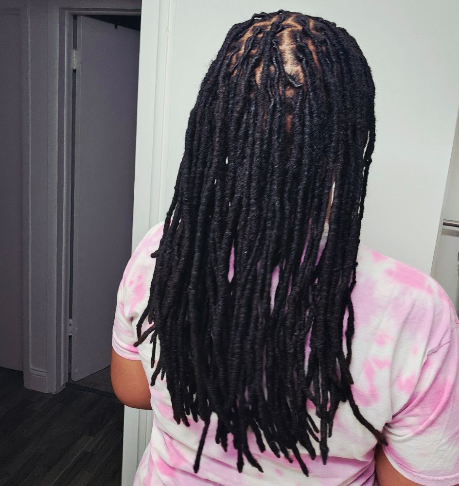 Ali's locs from the back.