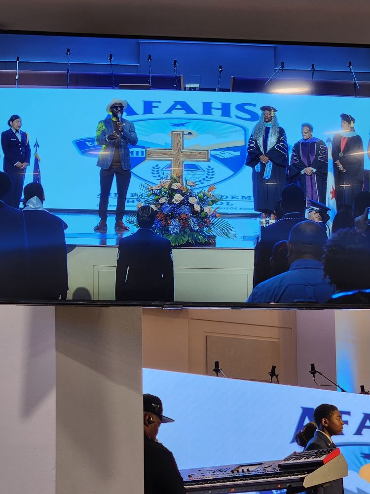 A big ol honkin cross in front of the seal of a public CPS school. Oh, and Lori Lightfoot, too.