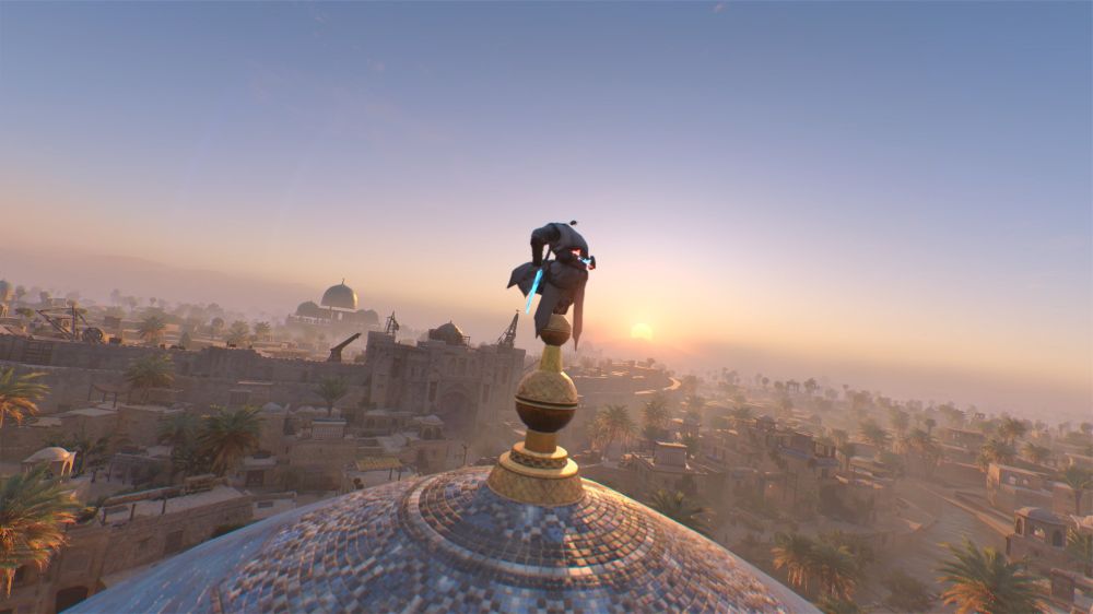 Perched at the very top.