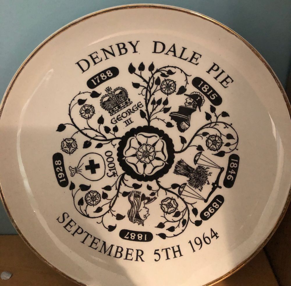 A commemorative plate marking times when the villagers of Denby Dale in Yorkshire produced celebratory pies to mark key events.