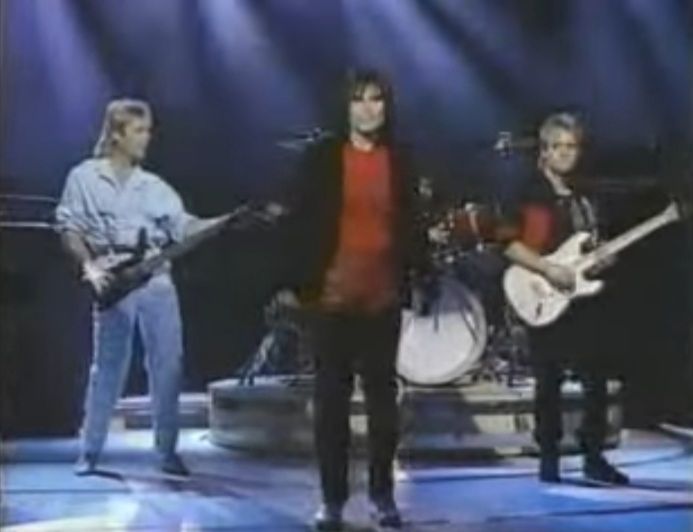 Still image from the music video for "High On You" by Survivor