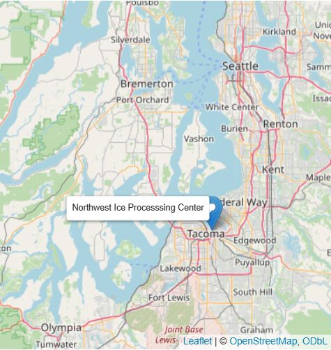 Northwest ICE Processing Center is indicated on a map by a blue marker and a label in Tacoma, Washington. Seattle can be seen to the north. Map by OpenStreetMap, ODbL using Leaflet.
