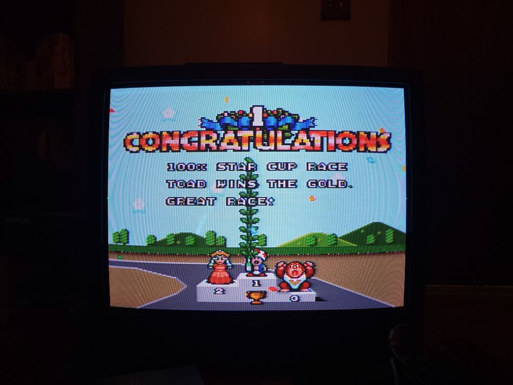 Super Mario Kart (1992) played on SNES - Toad is on the podium.