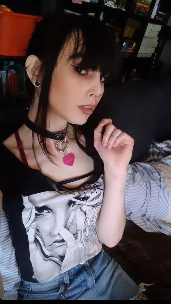 a selfie of dragonMaiden chilling in a hot topic shirt with Brittany Spears on it.
