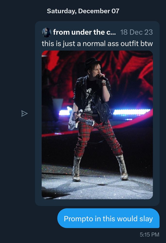 me in Twitter dms sending a message that says "Prompto in this would slay" attached to a photo of Patrick Stump from Fall Out Boy. he is wearing a black T-shirt, jacket, and hat; red plaid pants, a studded belt, and calf-high lace up white boots 
