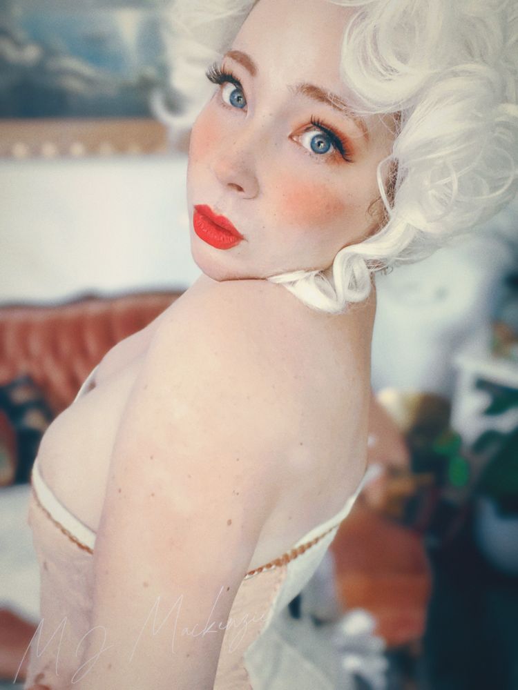 Portrait of MJ in a corset and a Marie Antoinette wig 