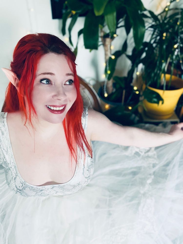 Portrait in a big crinoline skirt, shiny top and elf ears