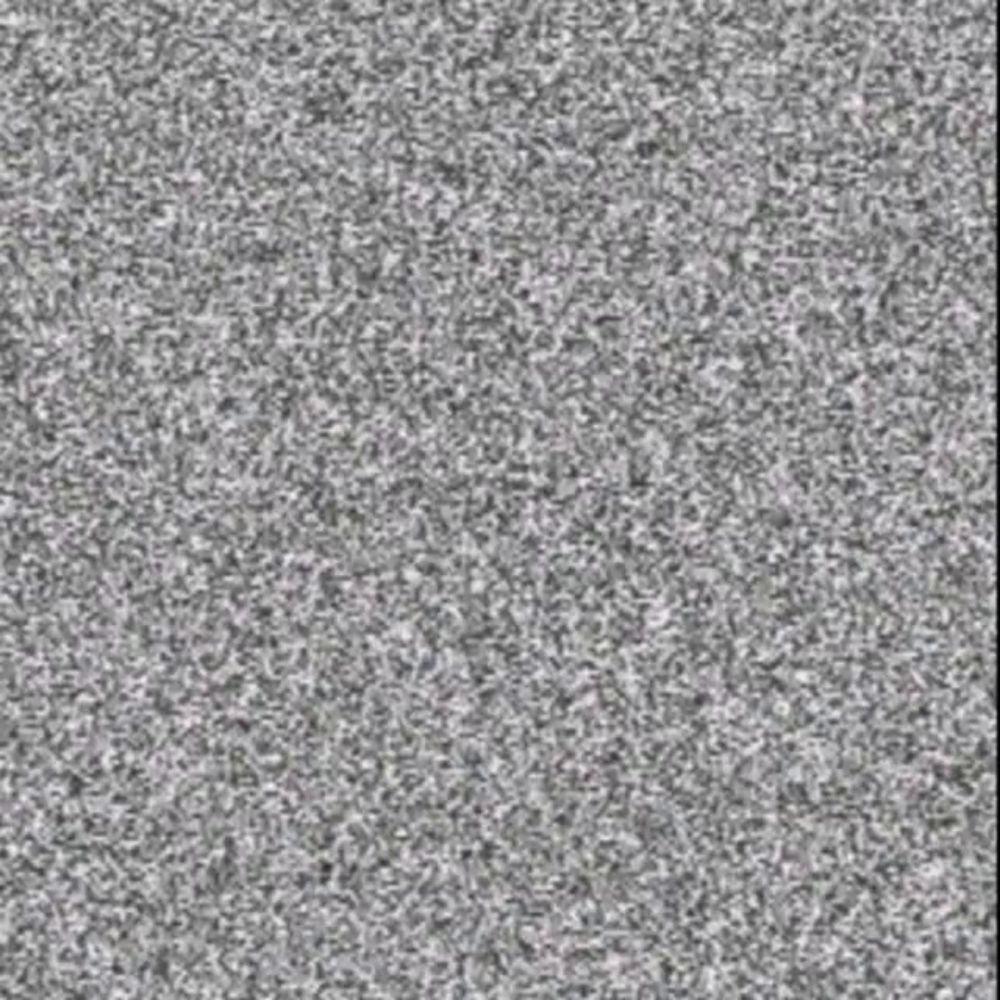 a close up of a gray carpet with a grainy texture