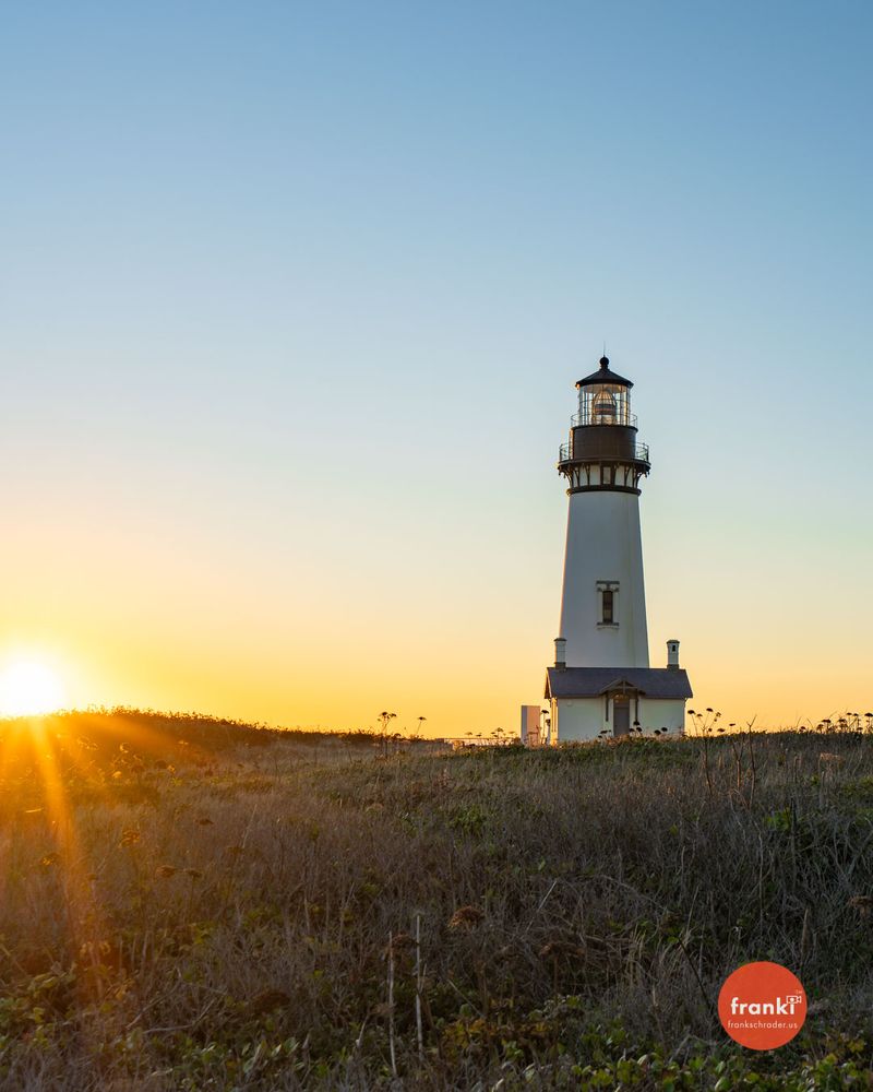 Yaquina Head Lighthouse in Newport, Oregon, photographed at sunset.