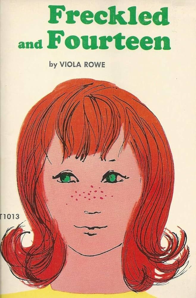 Book cover of Freckled and Fourteen by Viola Rowe. A drawing of a girl with red hair, green eyes and freckles.