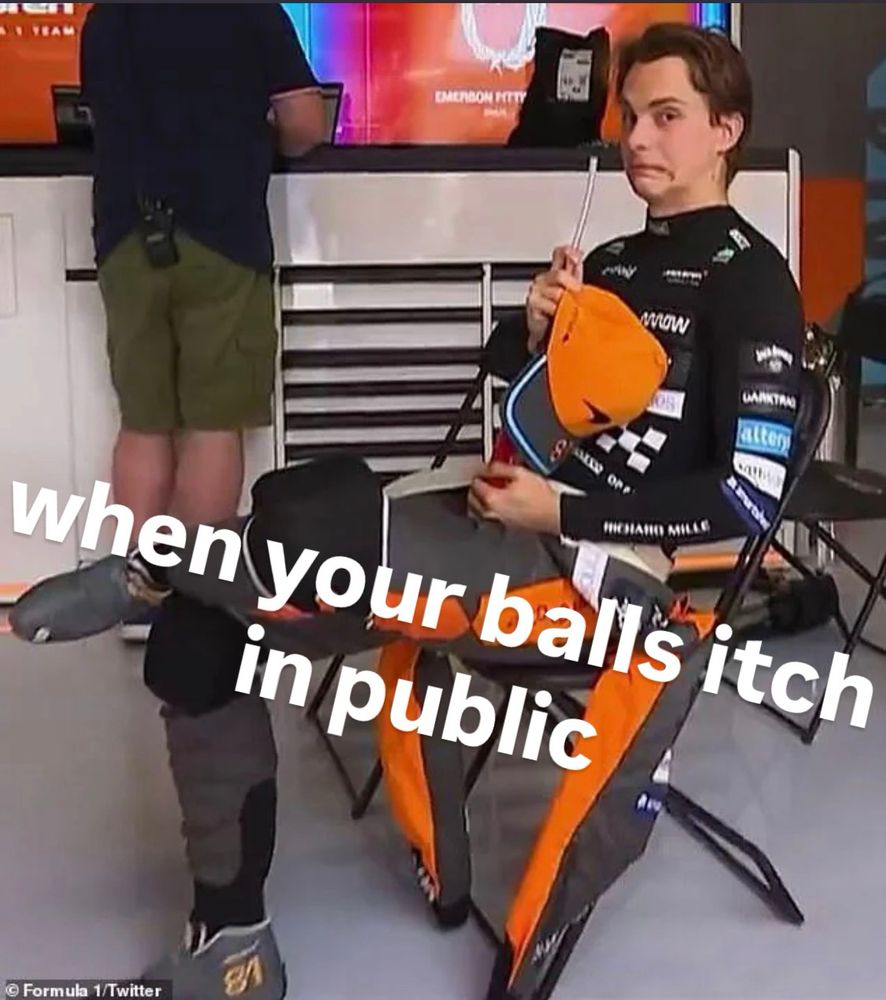 Oscar Piastri doing a side eye to the camera and cringing.

Caption: when your balls itch in public