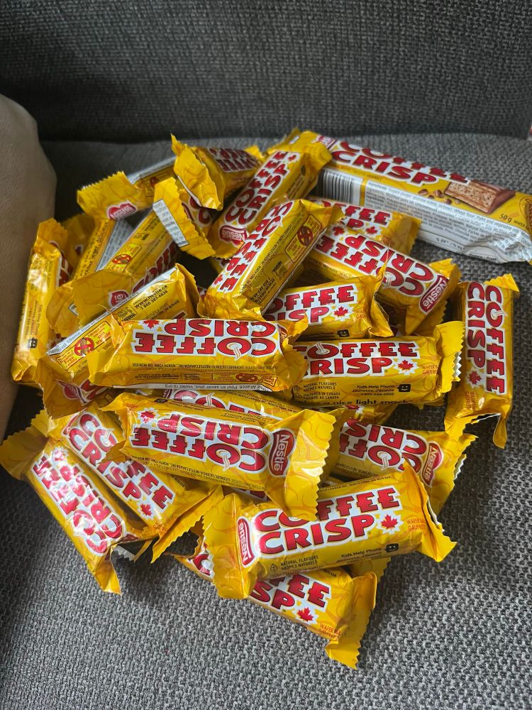 An obscene pile of coffee crisp chocolate Halloween candy. 